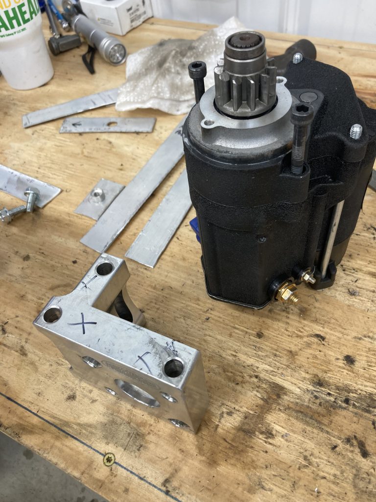 engine starter motor on workbench