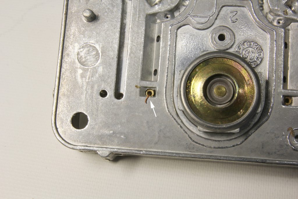 fuel port on a carburetor block