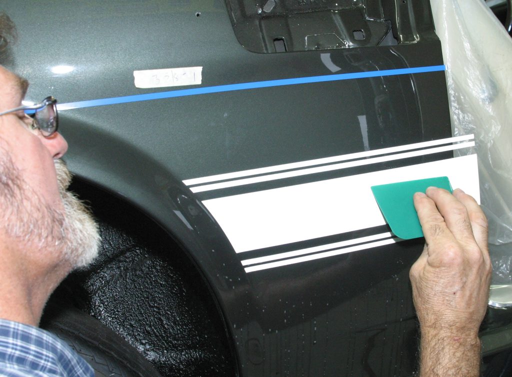 Installing quarter panel-to-door stripe on 1969 Shelby GT350
