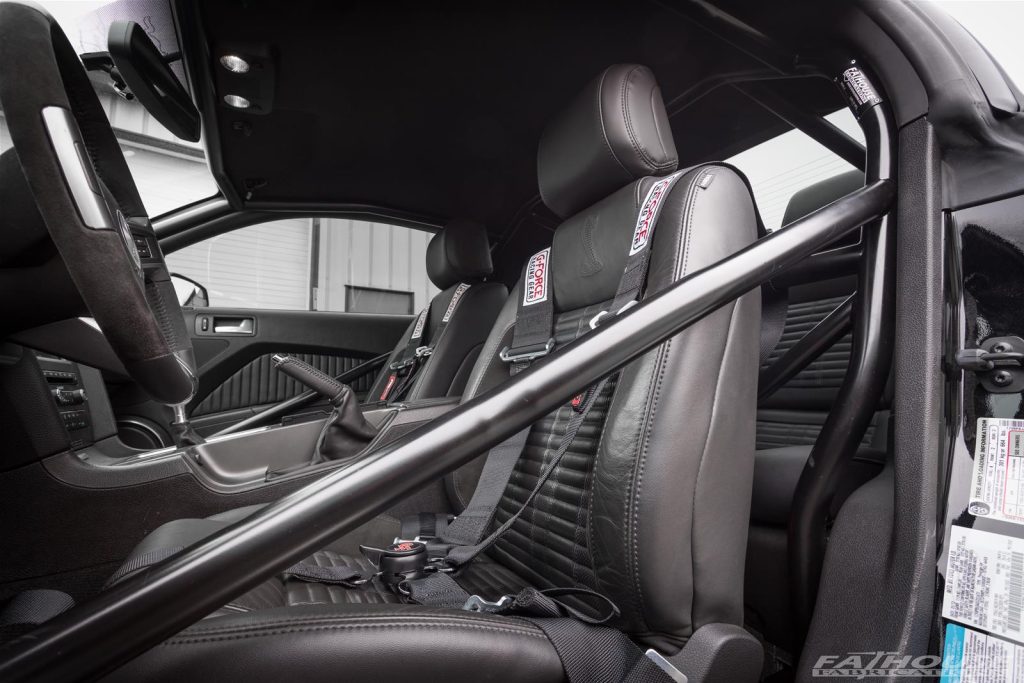 fat house performance roll cage installed in a mustang