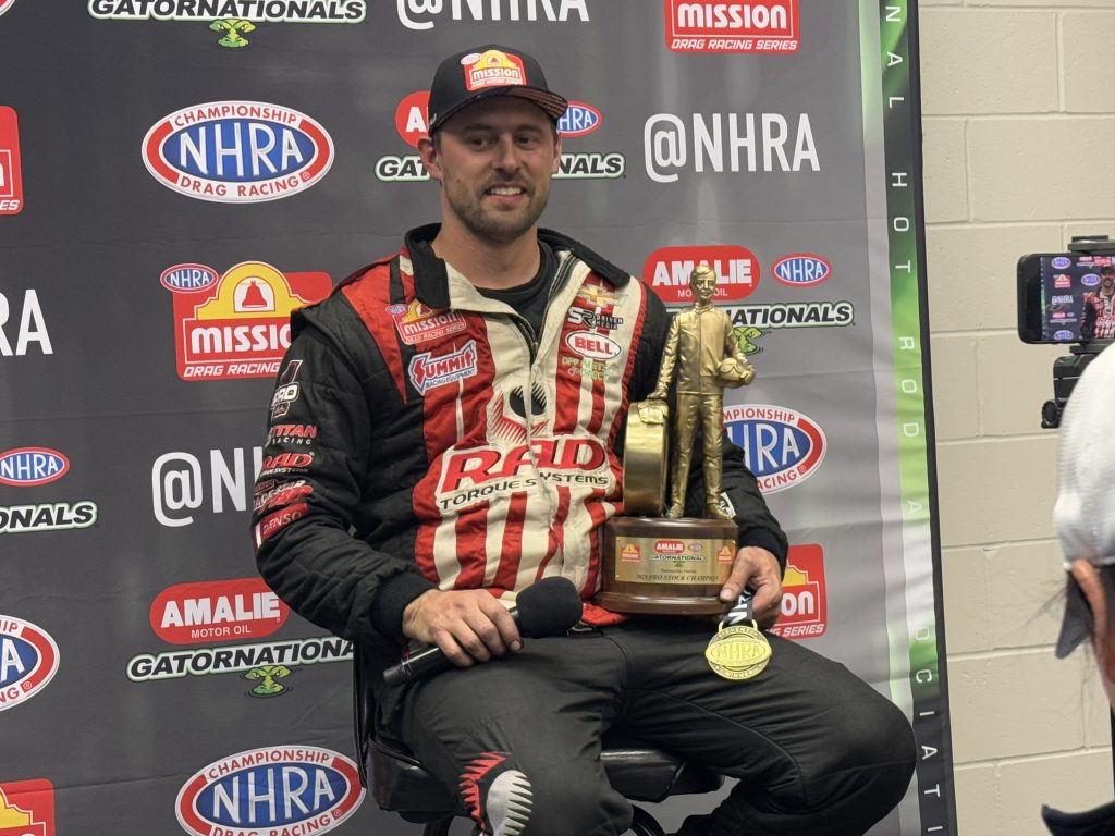 Dallas Glenn with Wally trophy at 2025 NHRA Gatornationals