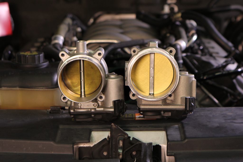 a side by side throttle body size comparison