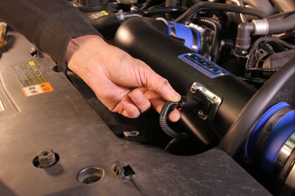 installing mass airflow MAF sensor onto a cold air intake tube
