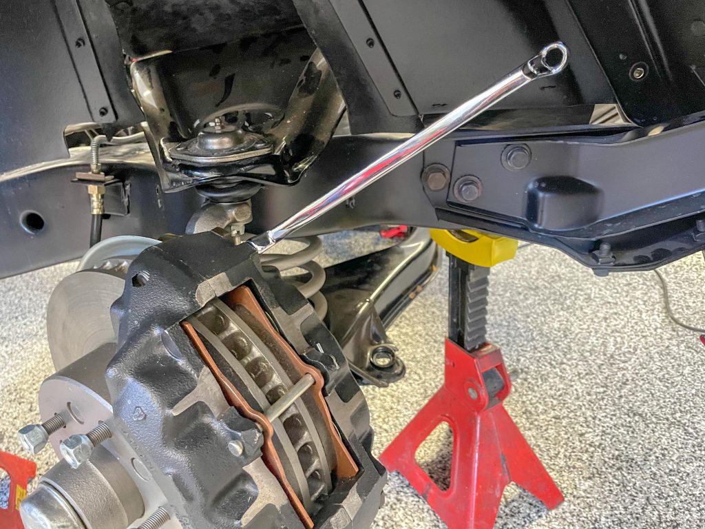 Brake fitting wrench on caliper bleeder screw