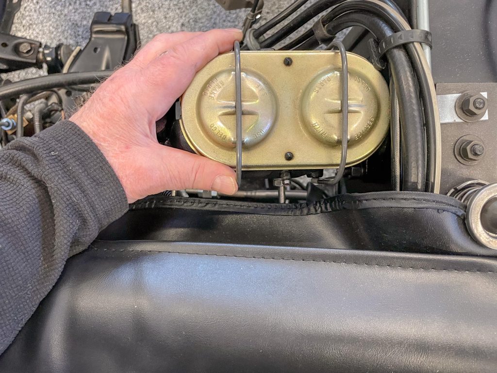 Checking fluid level in master cylinder