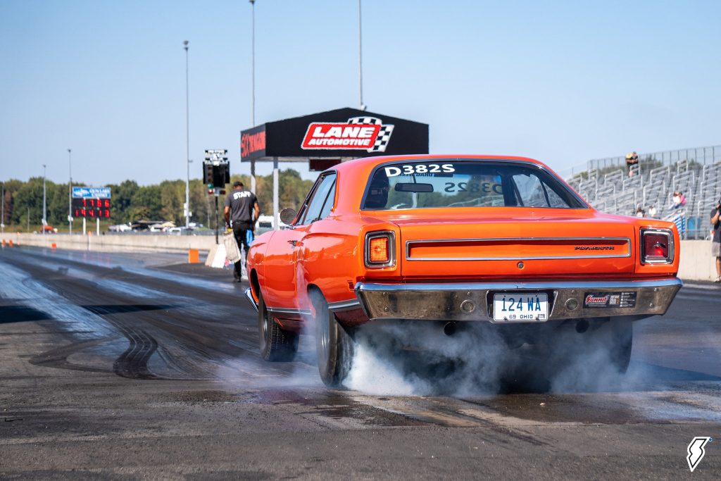 1969 Plymouth Satellite doing a burnout at dragstrip