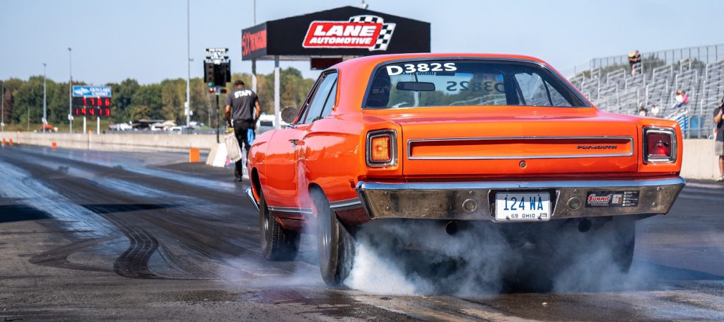 close up of 1969 Plymouth Satellite doing burnout