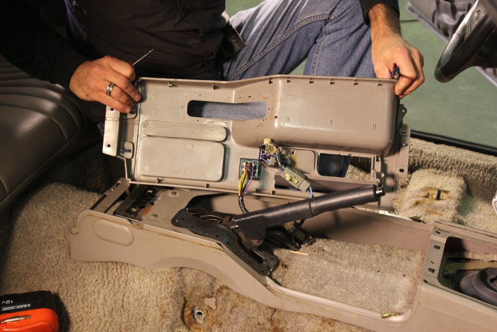 removing center console cover plastic from a fox mustang