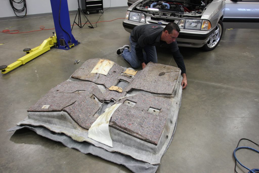 removing insulation from old car carpeting