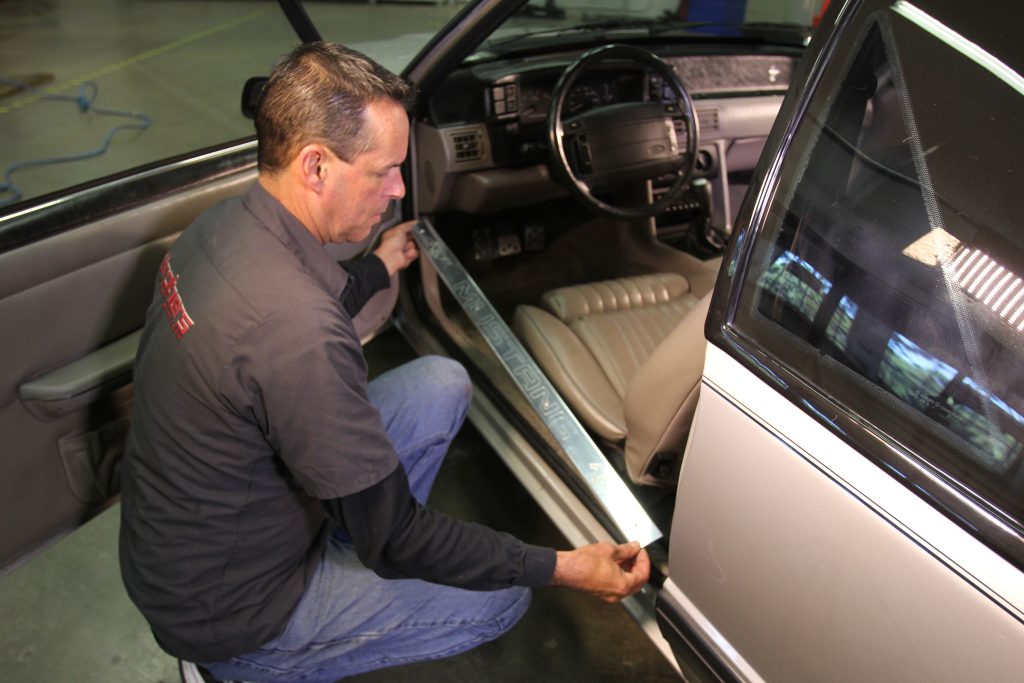 removing door sill protector from a fox mustang