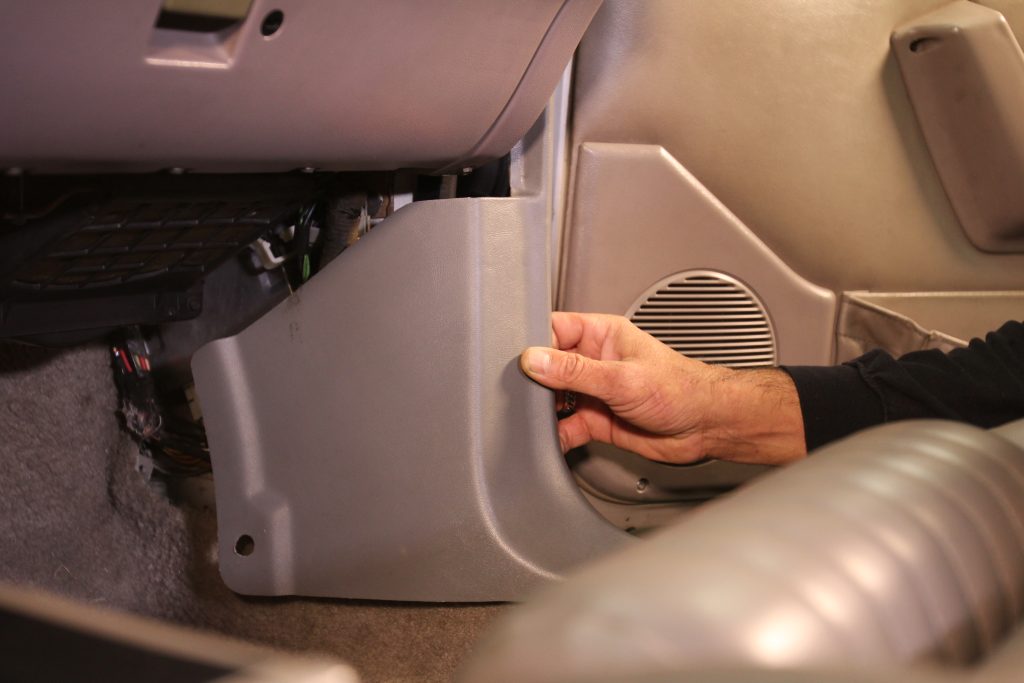 removing side plastic footwell cladding from a car