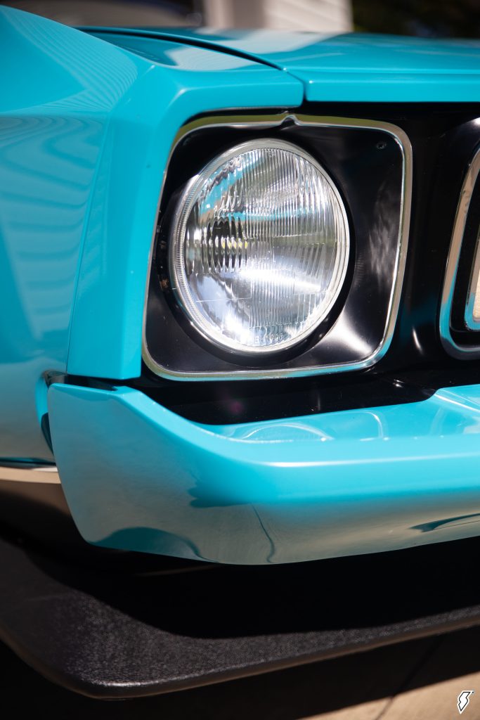 close up of headlight on a 1973 Ford Mustang Grande
