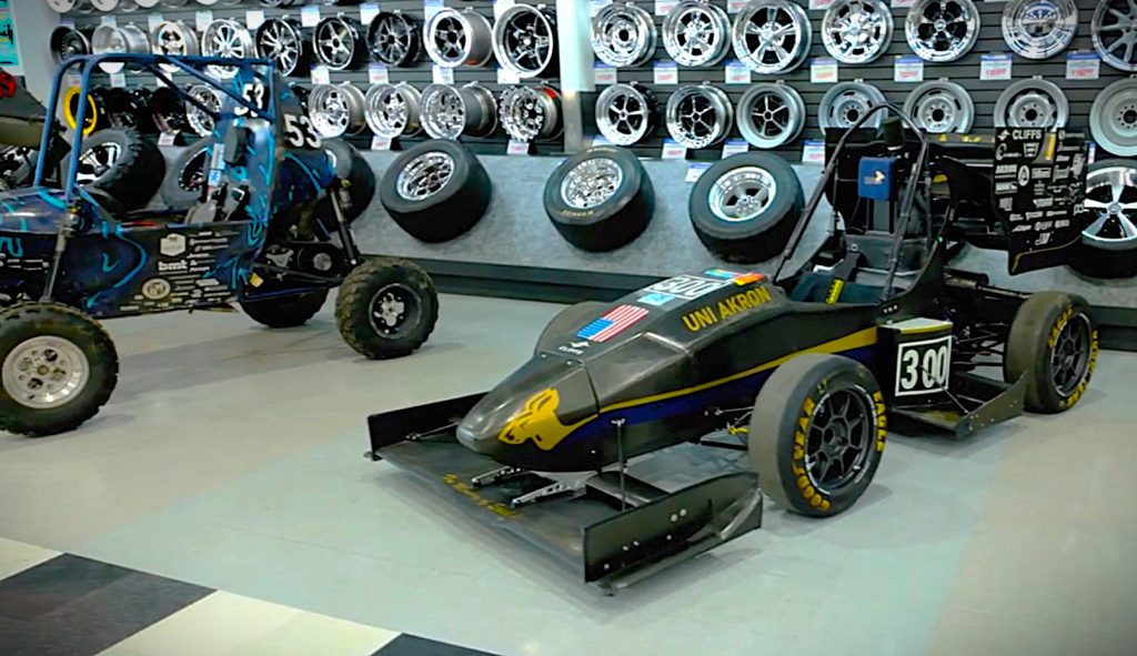 formula SAE cars on display at Summit Racing store